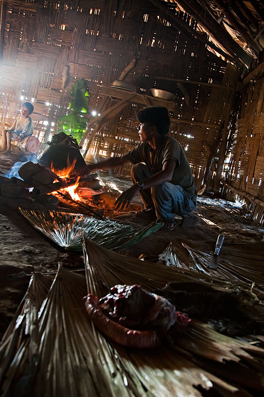  Slaughtering and cooking of a mithun, at Longwa   on the border with Myanmar